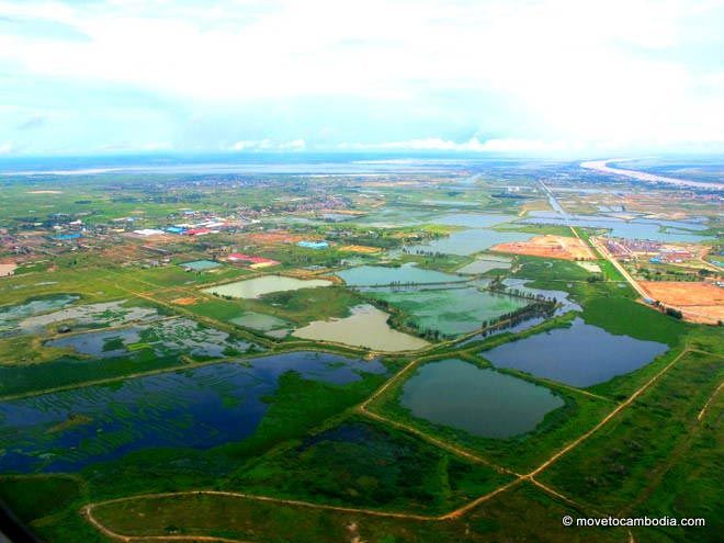 Cambodia through the plane window A view of the outskirts of Phnom Penh through the plane window.