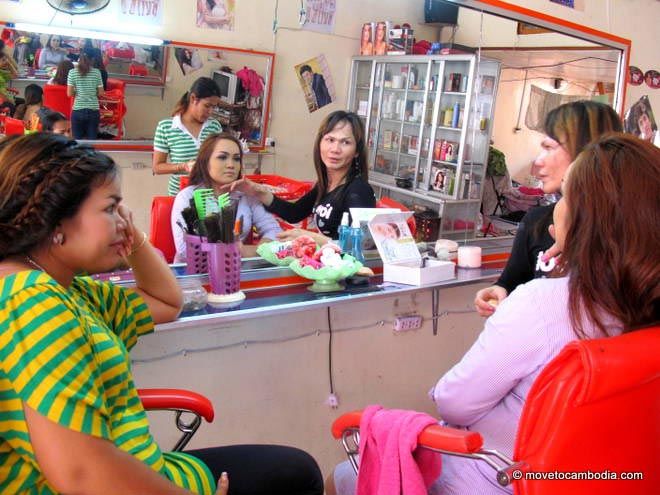 Cambodia hair salon A Cambodian wedding guest gets her hair and makeup done at a Phnom Penh salon.