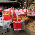 Toddler-sized Santa outfits in Cambodia.