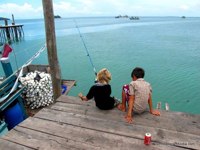 Koh Rong kids A couple of kids fishing off the Koh Rong pier.