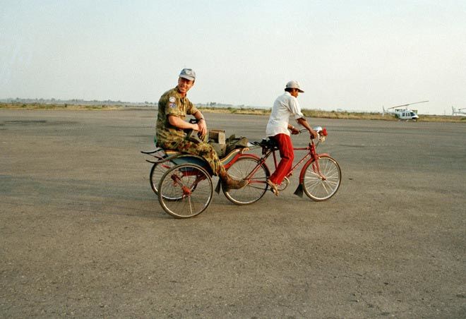 Phnom Penh UNTAC An Australian soldier about to board an UNTAC helicopter, Phnom Penh, 1993.