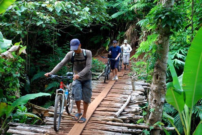 crossing the bridge in chi phat Chi Phat ecotourism
