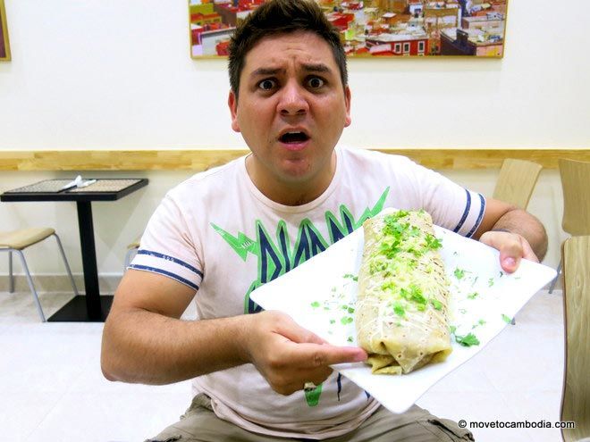 La Cita burrito A La Cita medium burrito that is the size of a small child.