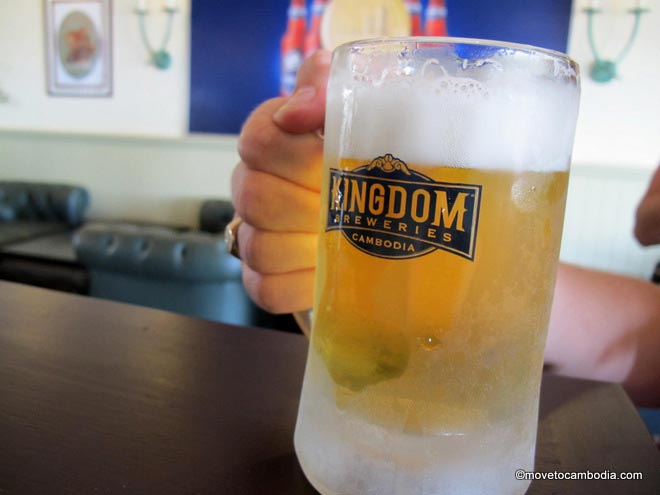 Kingdom Breweries mug filled with beer