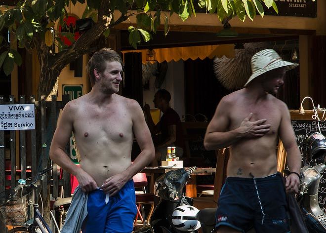 Topless dudes on Pub Street.